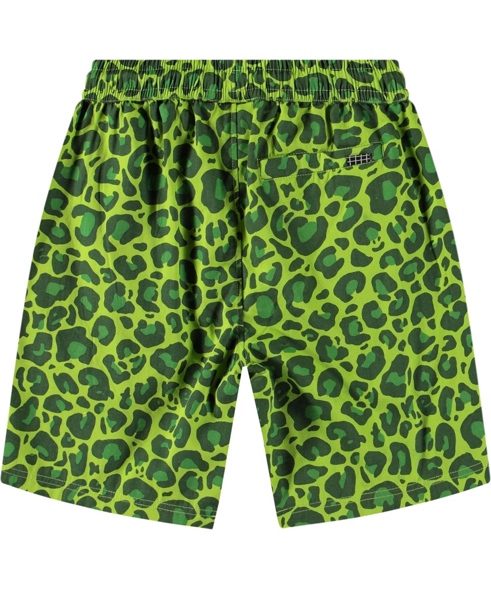 Avart - Jaguar_Green - Knälånga shorts i ekologisk bomull med ett grönt jaguarmönster för barn.