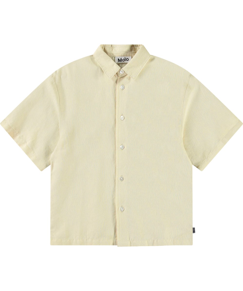 Richie - Alabaster - Oversized beige linneskjorta med vida t-shirt-ärmar, klassisk skjortkrage och knäppning framtill.