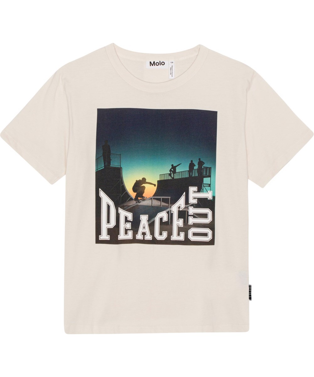 Riley - Peace Out Skate - Beige ekologisk t-shirt med skate mönster.