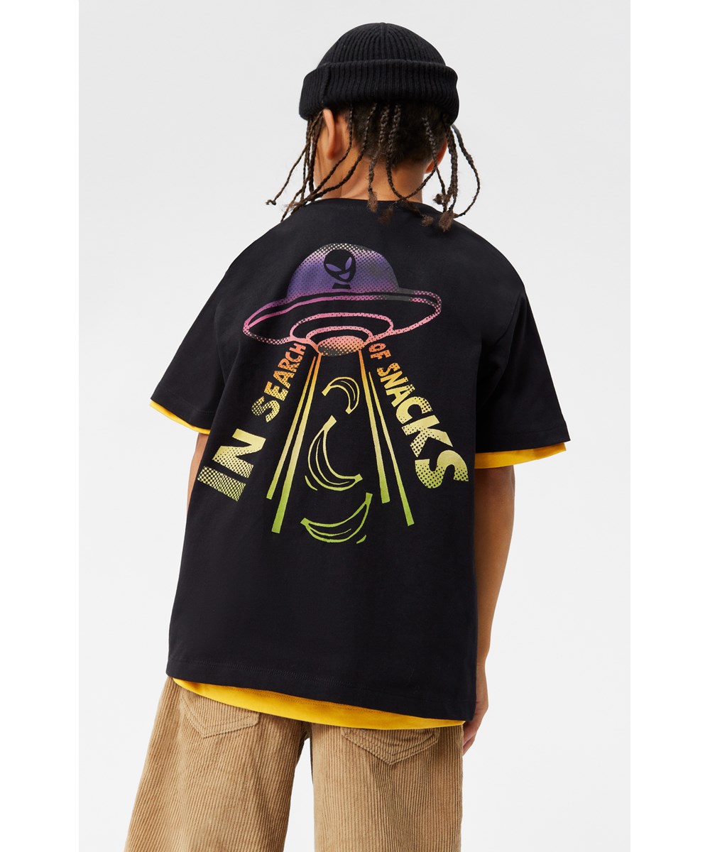 Rodney - In Search Of___ - Svart T-shirt i ekologisk bomull med UFO-tryck fram och bak.