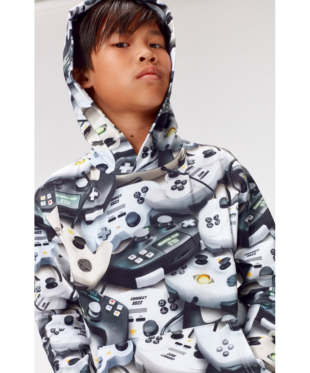 Romo - Connected - Ekologisk huvtröja med gamingmönster.