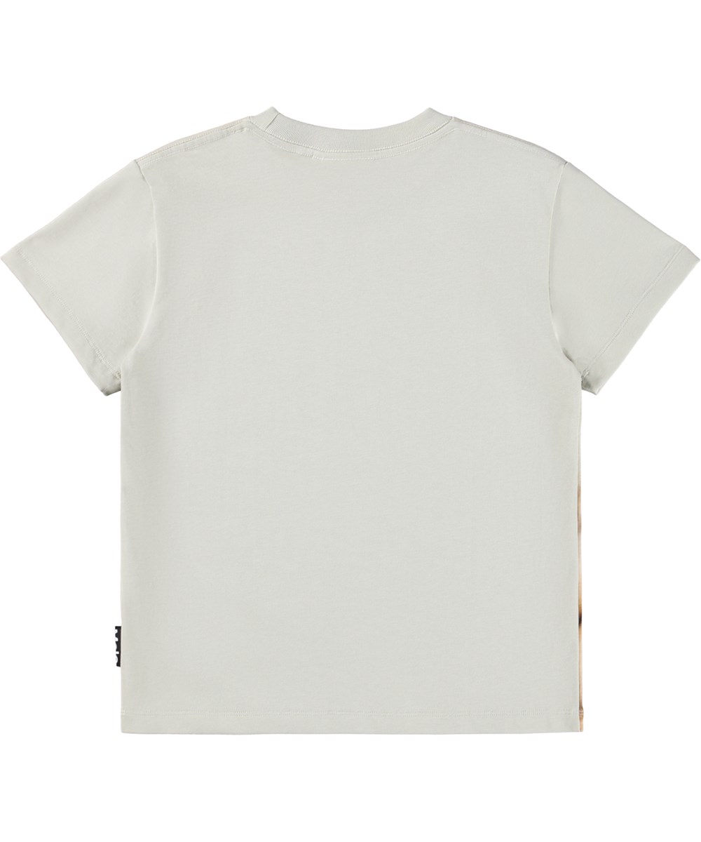 Roxo - Lions - Beige T-shirt med lös passform för barn i mjuk ekologisk bomull med korta ärmar och en ribbad halsringning.