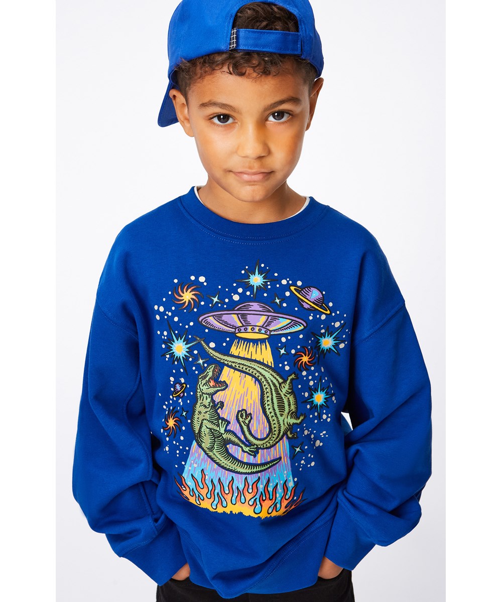 Magni - Reef Blue - Blå sweatshirt med multifärgat dino ufo mönster.