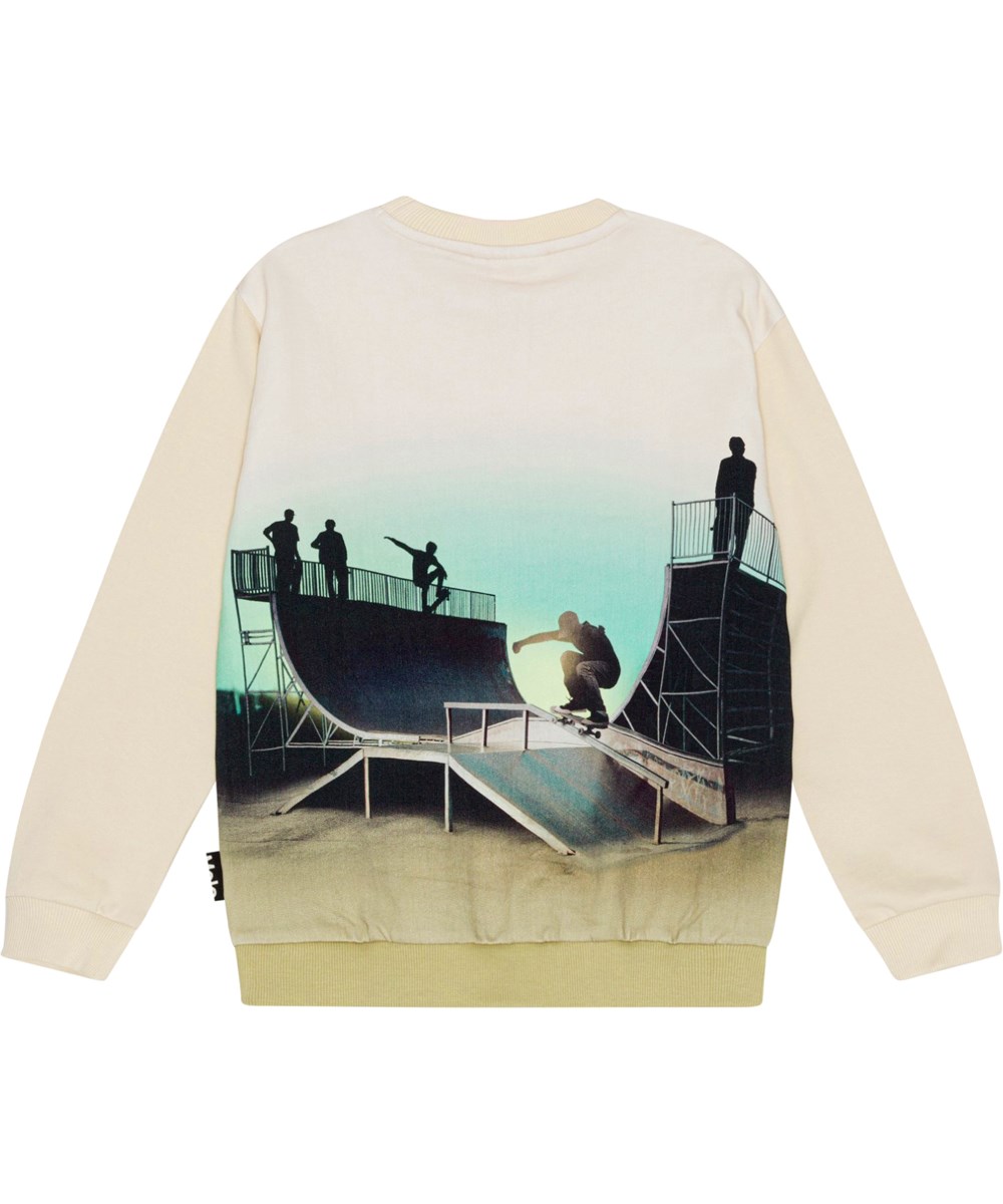 Miksi - Backlit Halfpipe - Beige ekologisk sweatshirt med skatemönster.