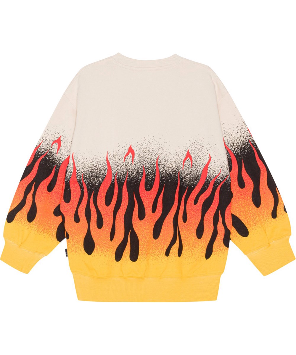 Monti - On Fire - Beige ekologisk sweatshirt med orange eldslågor.