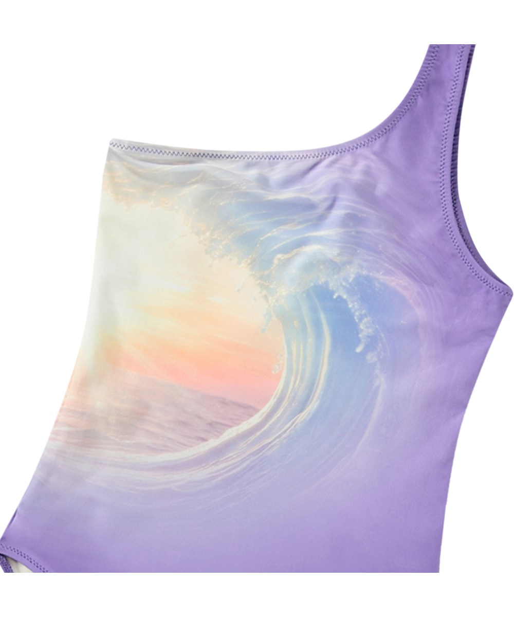 Nai - Over The Sea - Purple one-shoulder swimsuit for children in recycled polyester with UV protection 50+.