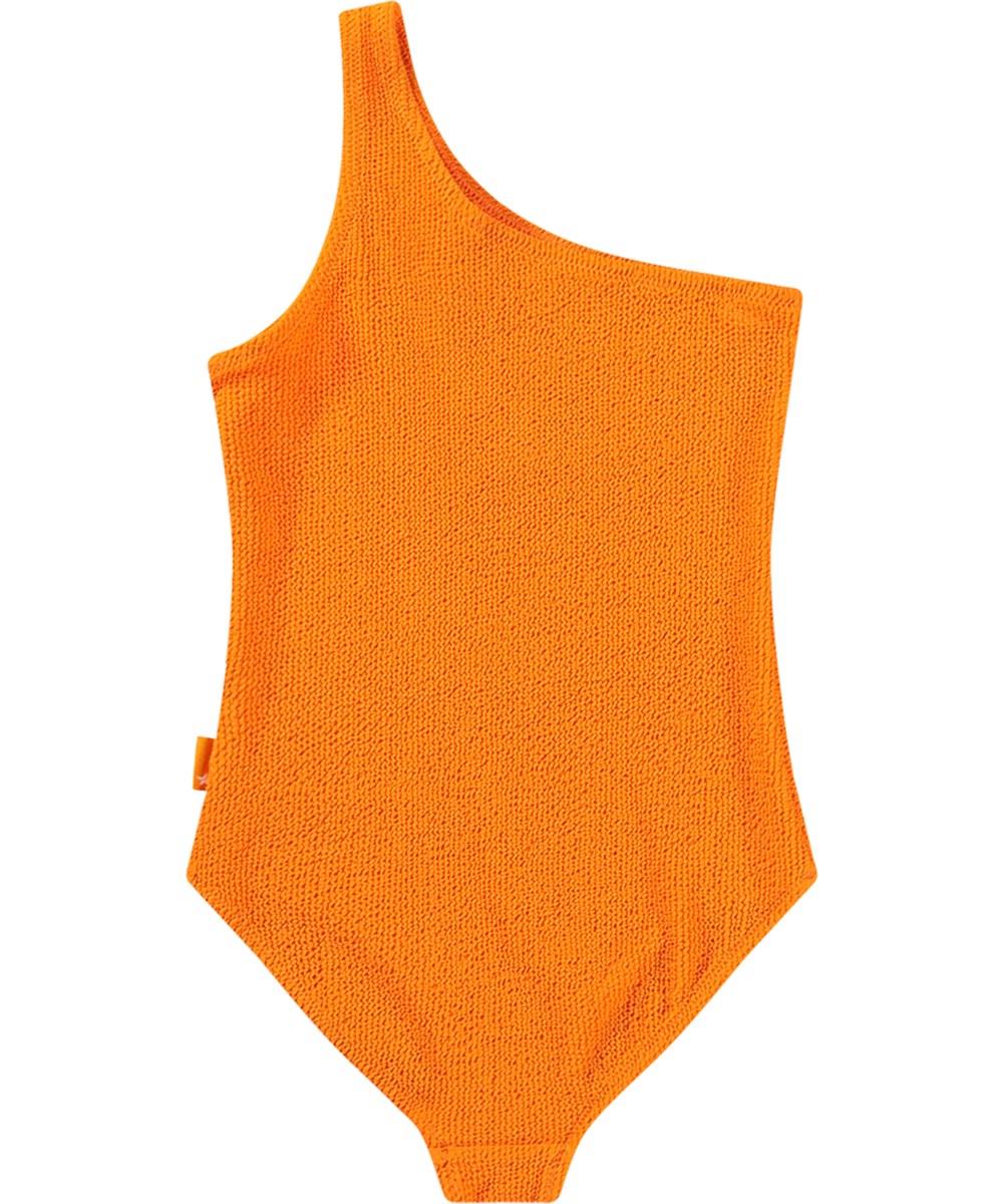 Nai Solid - Tumeric - Orange one-shoulder swimsuit for children with texture and UV protection 50+.