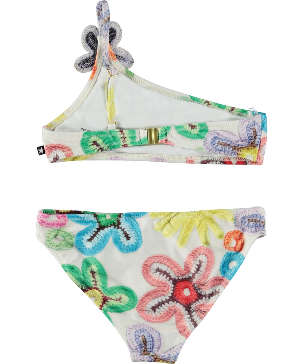 Naja - Flower Power - Asymmetrical bikini with print of crochet flowers and peace signs