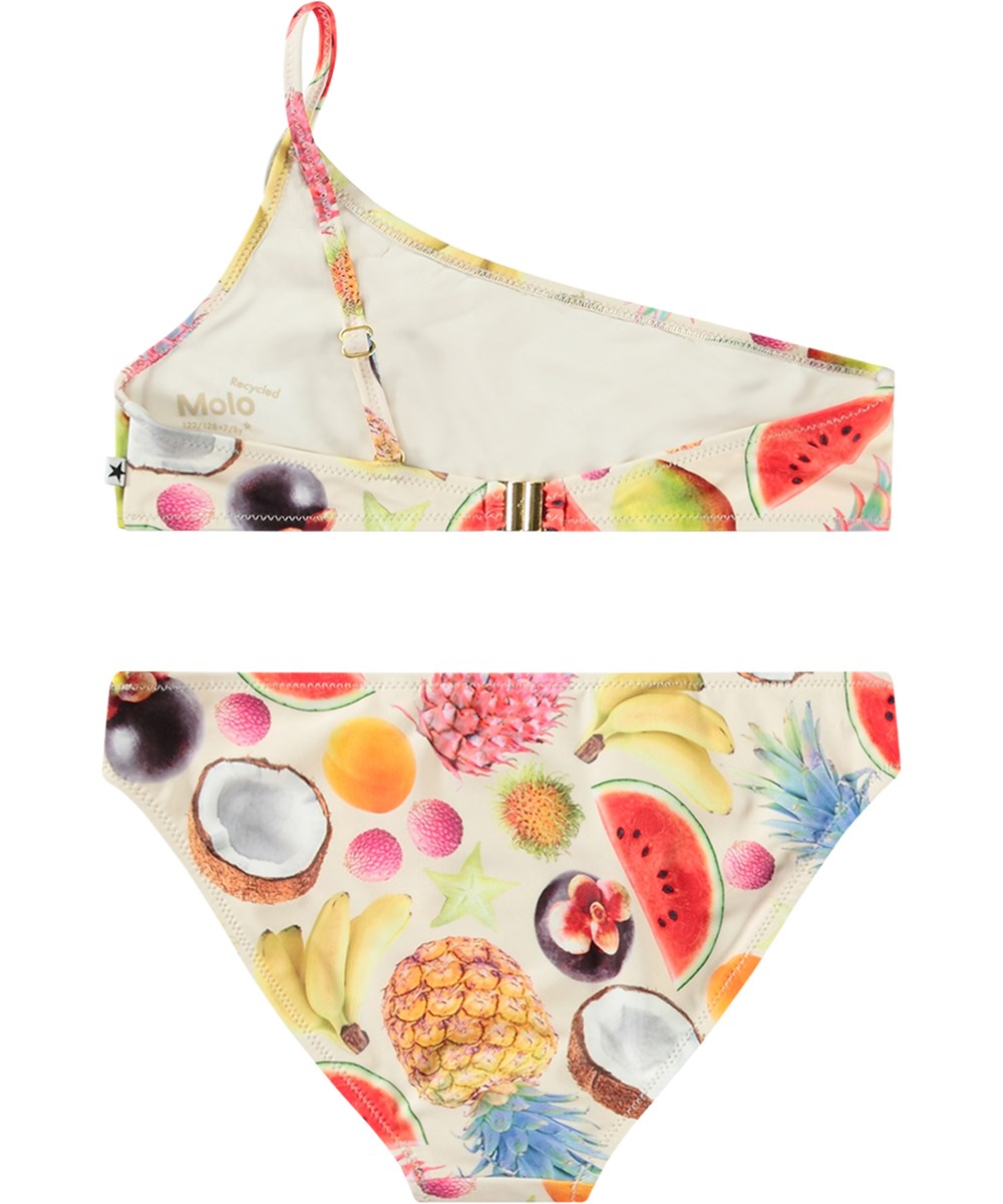 Naja - Magical Fruits - White asymmetrical bikini for children in recycled polyester with UV protection 50+.
