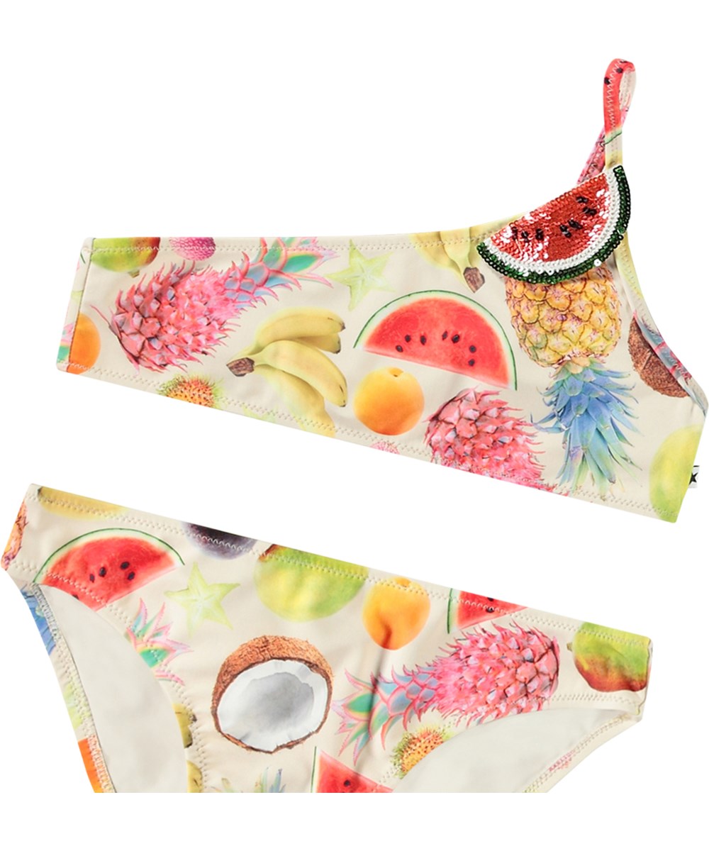 Naja - Magical Fruits - White asymmetrical bikini for children in recycled polyester with UV protection 50+.