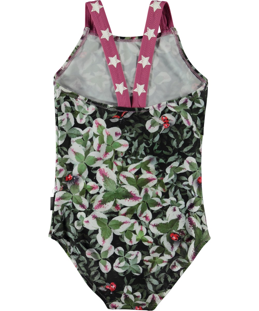 Nakia - Clover - Green swimsuit with clover print.