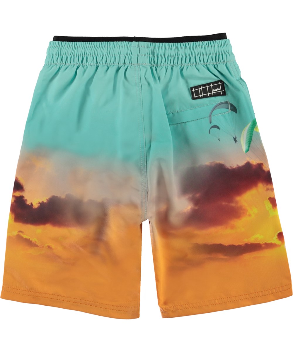 Neal - Parachute - Turquoise and orange swim shorts with skydivers 