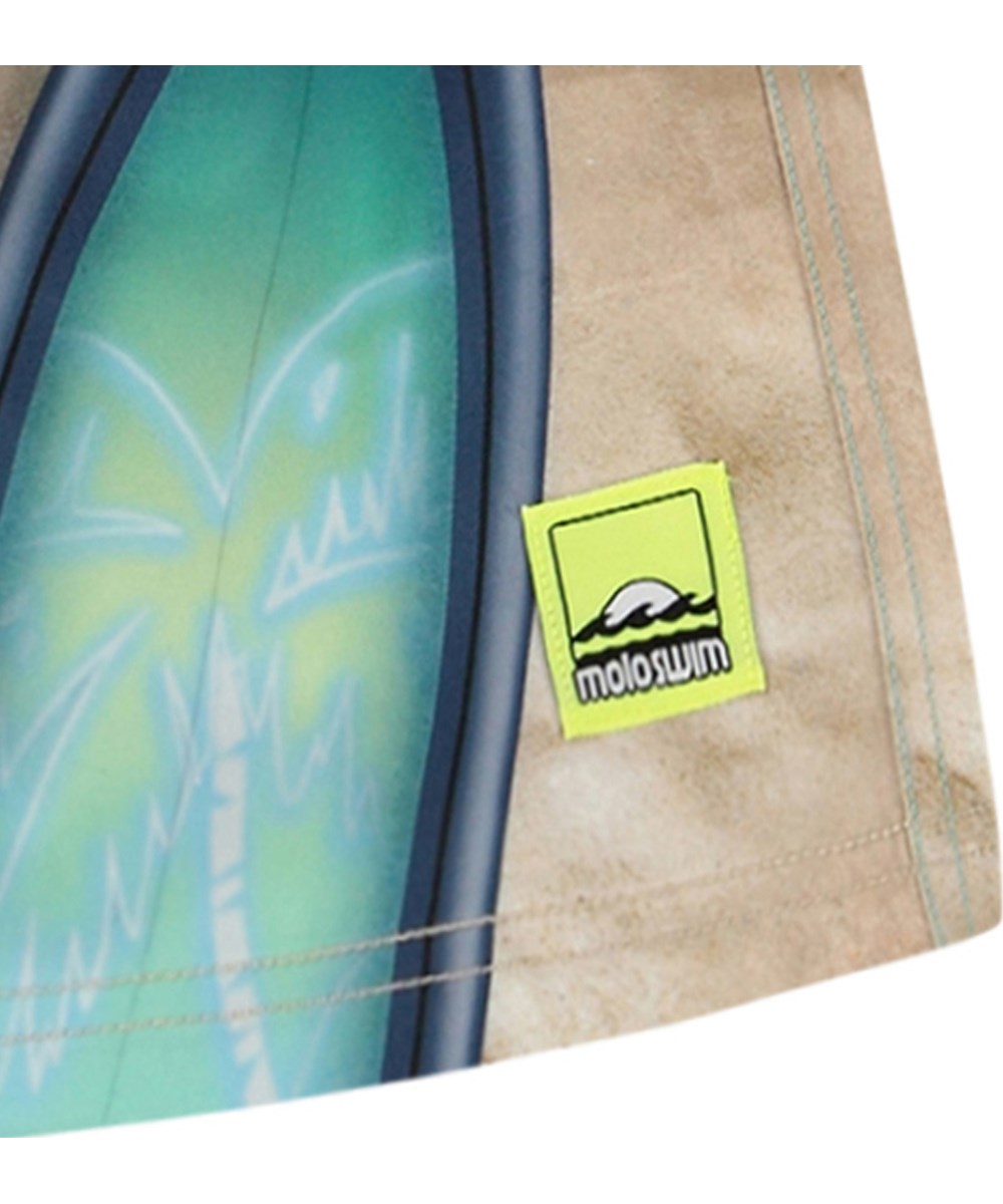 Neal - Surf Art - Knee-length beige and turquoise swimming shorts for active children in recycled polyester with UV protection 50+.