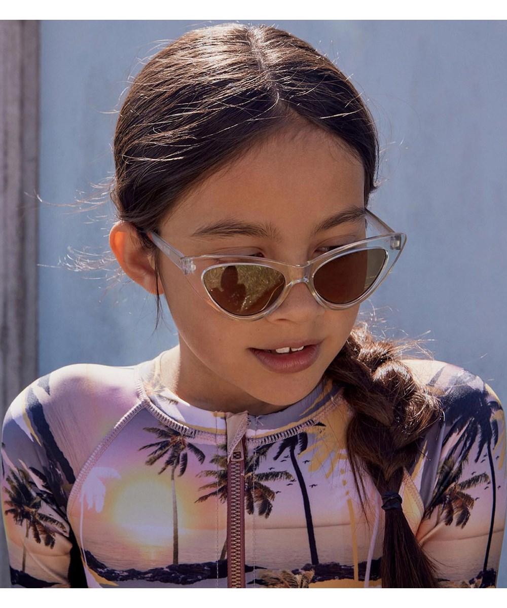 Necky - Sunset - UV swimsuit with palm tree print