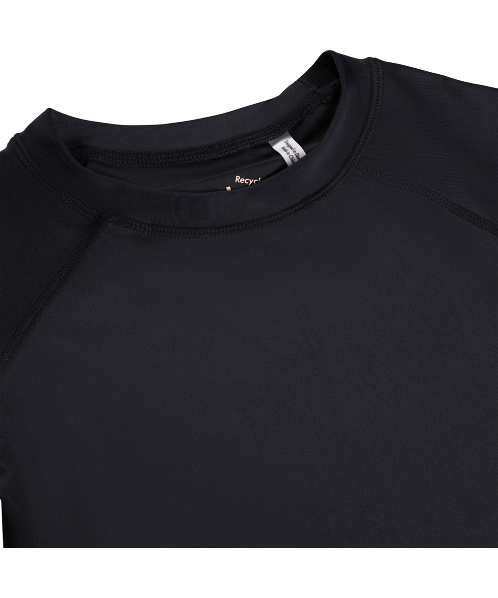 Neptune - Black - Black swimming shirt for children made from recycled polyester with UV protection 50+.