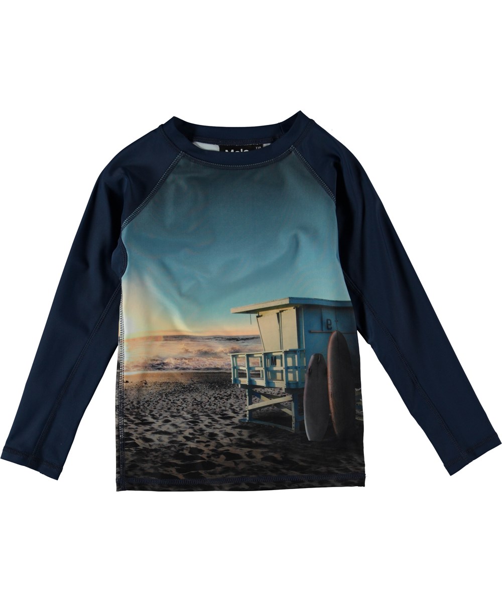 Neptune LS - On The Beach - UV rash guard with beach.