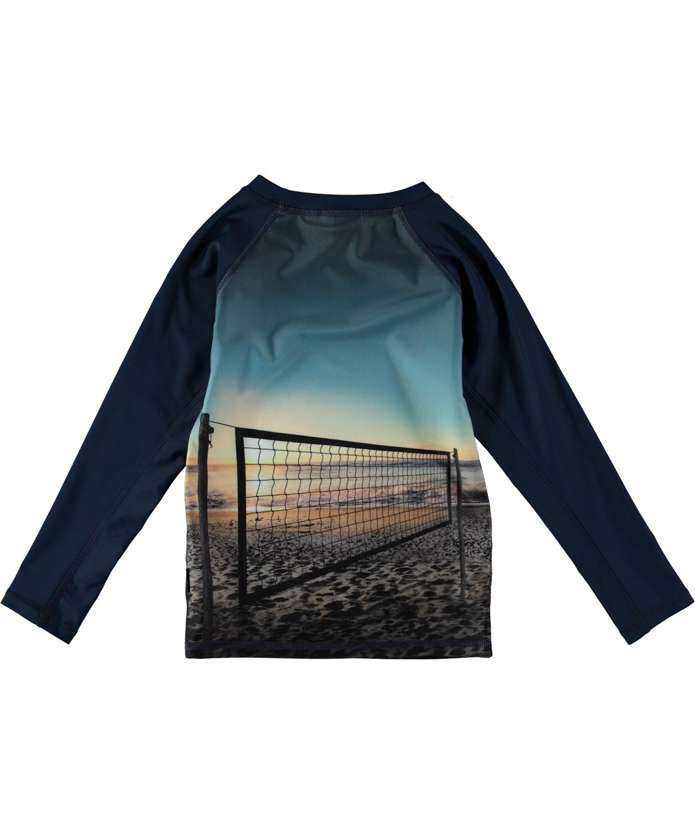 Neptune LS - On The Beach - UV rash guard with beach.