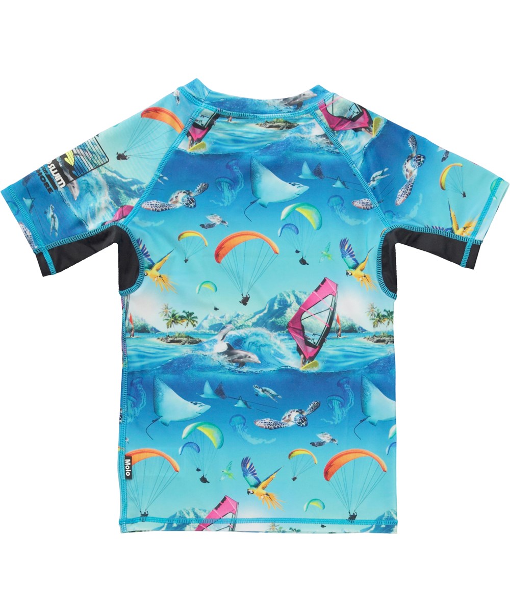 Neptune - Passion For Motion - UV rash guard in light blue with a print of sports and animals 