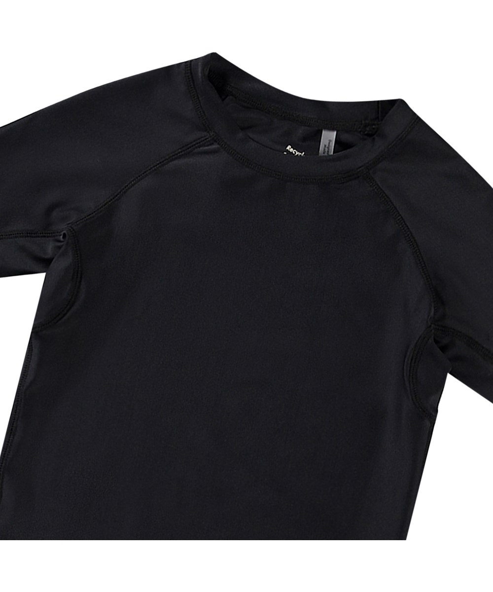 Neptune - Black - Black short sleeve rashguard for active children, made from recycled polyester with UV protection 50+.