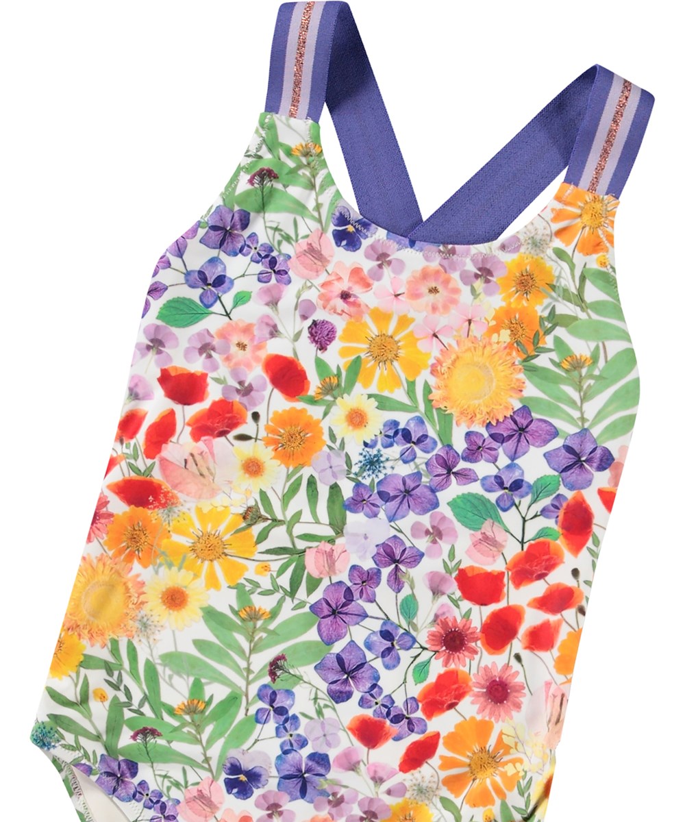 Neve - Flowerpress - Swimsuit with floral print for active children in recycled polyester and UV protection 50+.