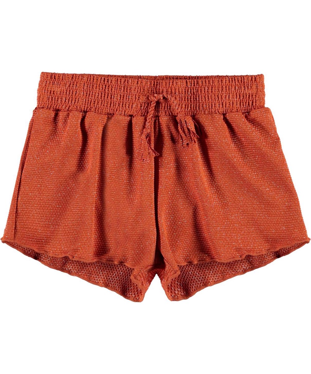 Nicci - Rusty - UV swim trunks in rust red with gold thread 