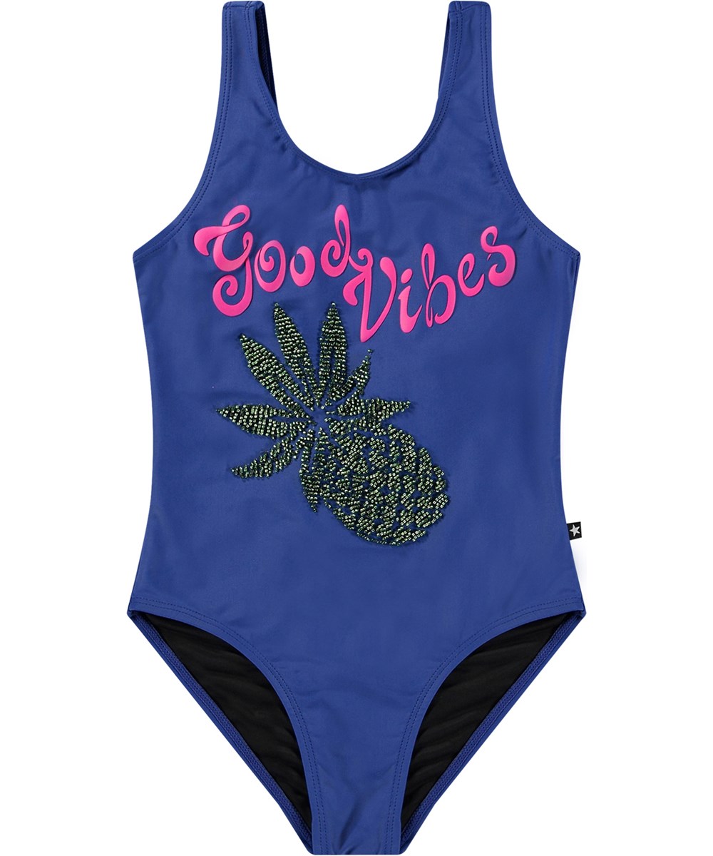 Nika - Sparkling Fruit - Blue swimsuit for active children in recycled polyester with UV protection 50+.