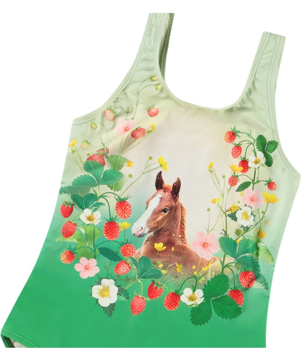 Nika - Beauty - Green swimsuit with print for active children in recycled polyester with UV protection 50+.