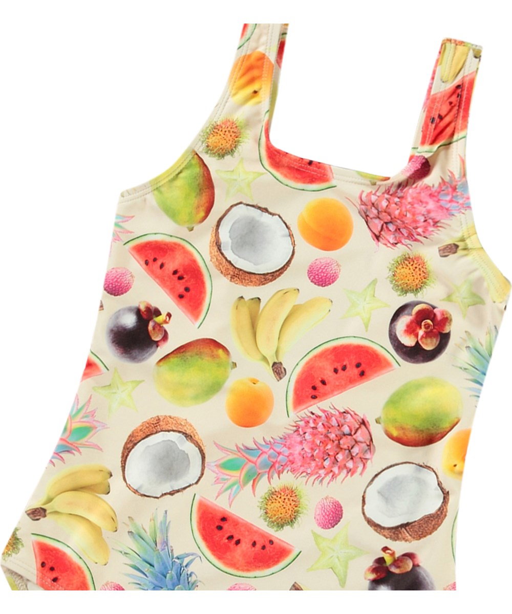 Nika - Magical Fruits - Swimsuit with print for active children in recycled polyester with UV protection 50+.