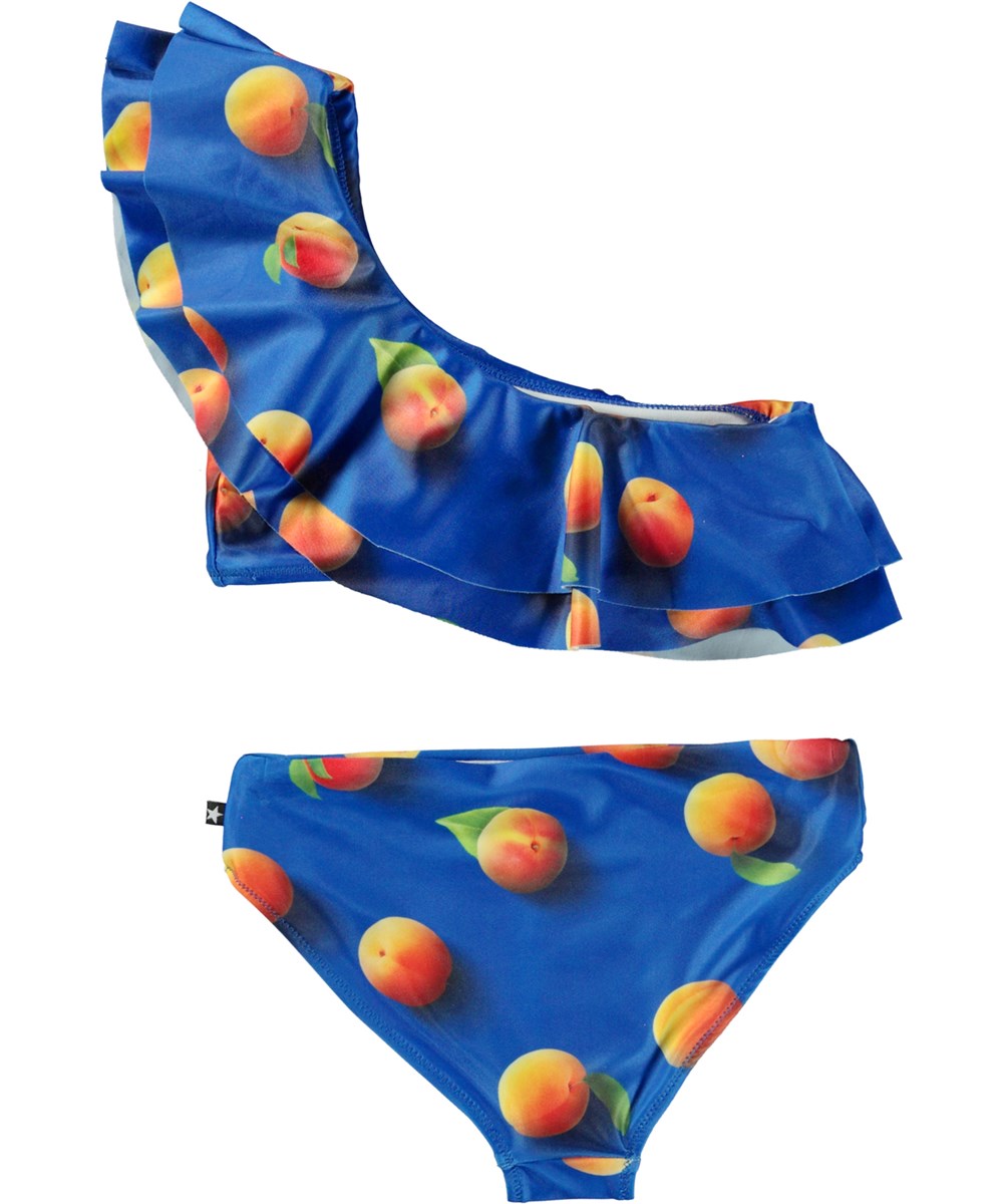 Nikkie - Apricot - Dark blue asymmetrical bikini with ruffles and apricot print