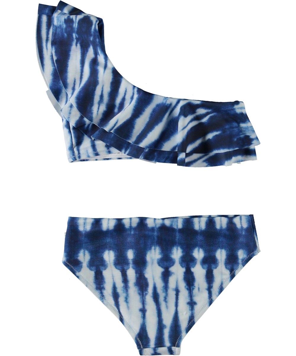 Nikkie - Tie Dye Vertical - Asymmetrical bikini in blue with tie-dye print and ruffle edge