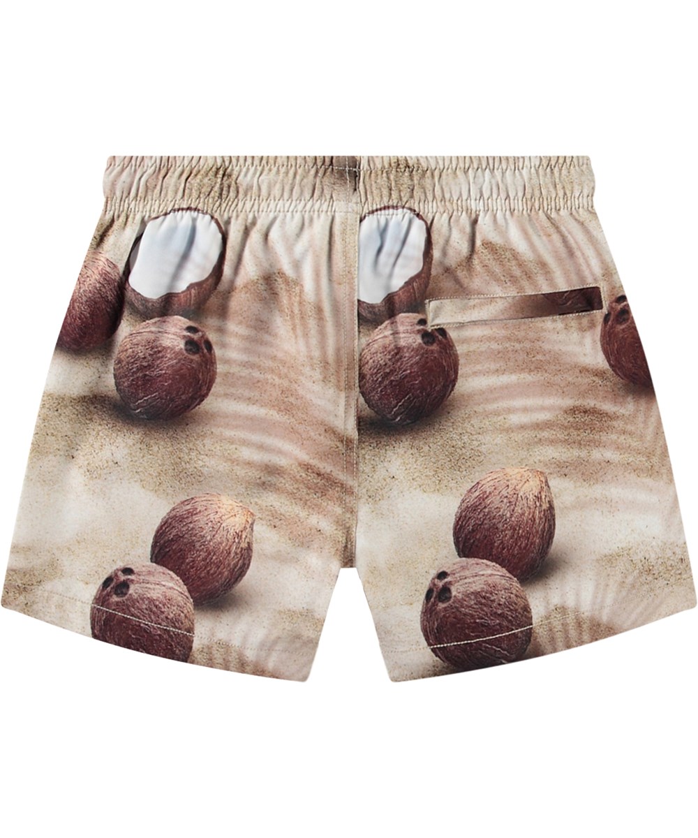 Niko - Coconuts - Beige sporty swim shorts for active children in recycled polyester with UV protection 50+.