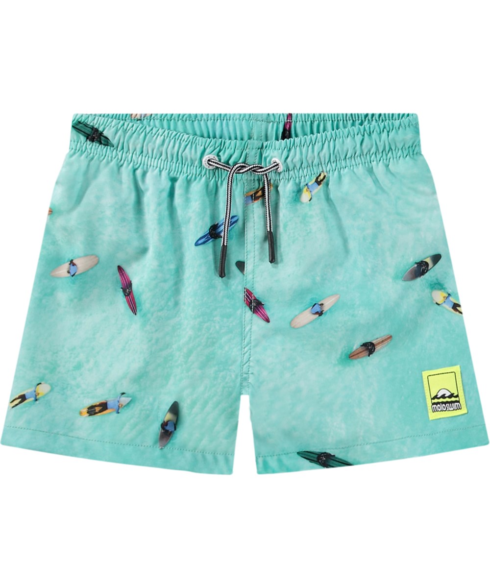 Niko - Ocean Surfers - Turquoise blue sporty swim shorts for active children in recycled polyester with UV protection 50+.