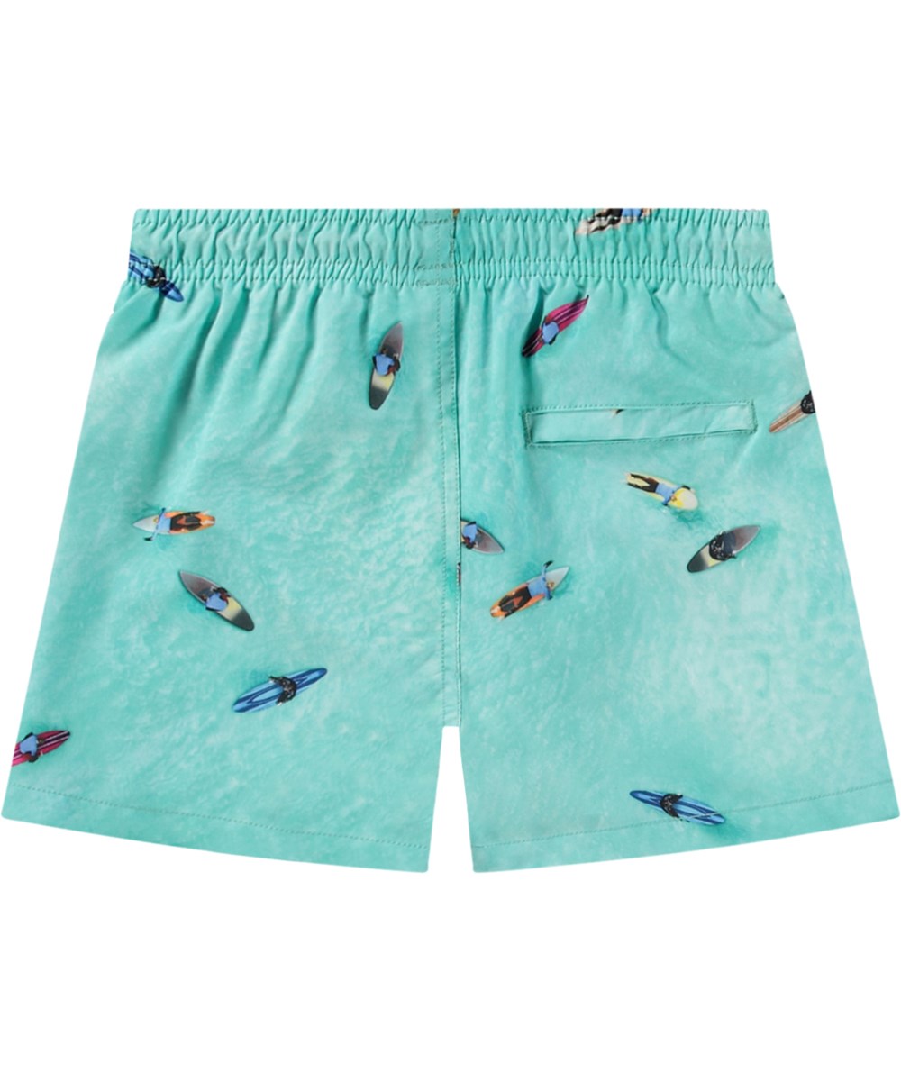 Niko - Ocean Surfers - Turquoise blue sporty swim shorts for active children in recycled polyester with UV protection 50+.