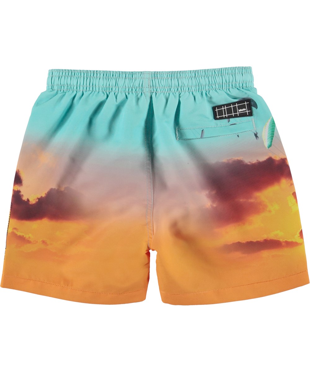 Niko - Parachute - Turquoise and orange swim shorts with skydivers 