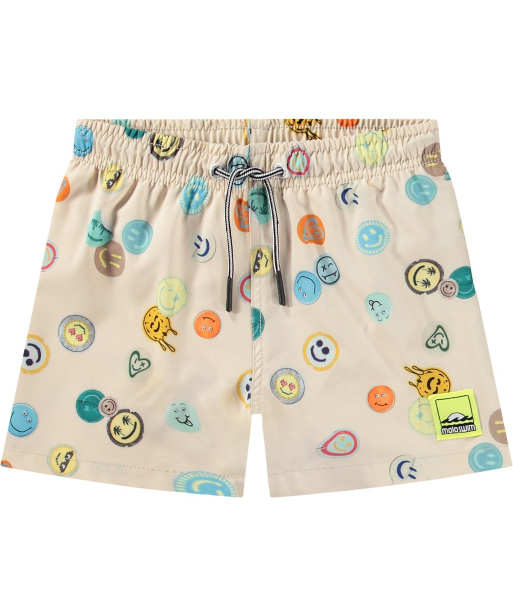 Niko - Sand Smile - Beige sporty swim shorts for active children in recycled polyester with UV protection 50+.