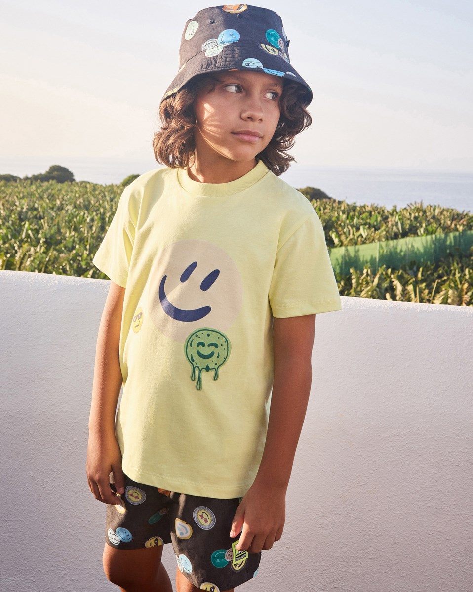 Niko - Smile All Over - Black sporty swim shorts for active children in recycled polyester with UV protection 50+.