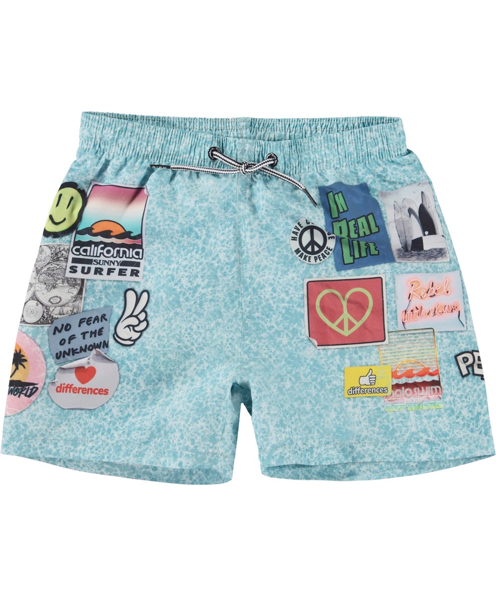 Niko - Stickers - Light blue swim shorts with print of stickers 