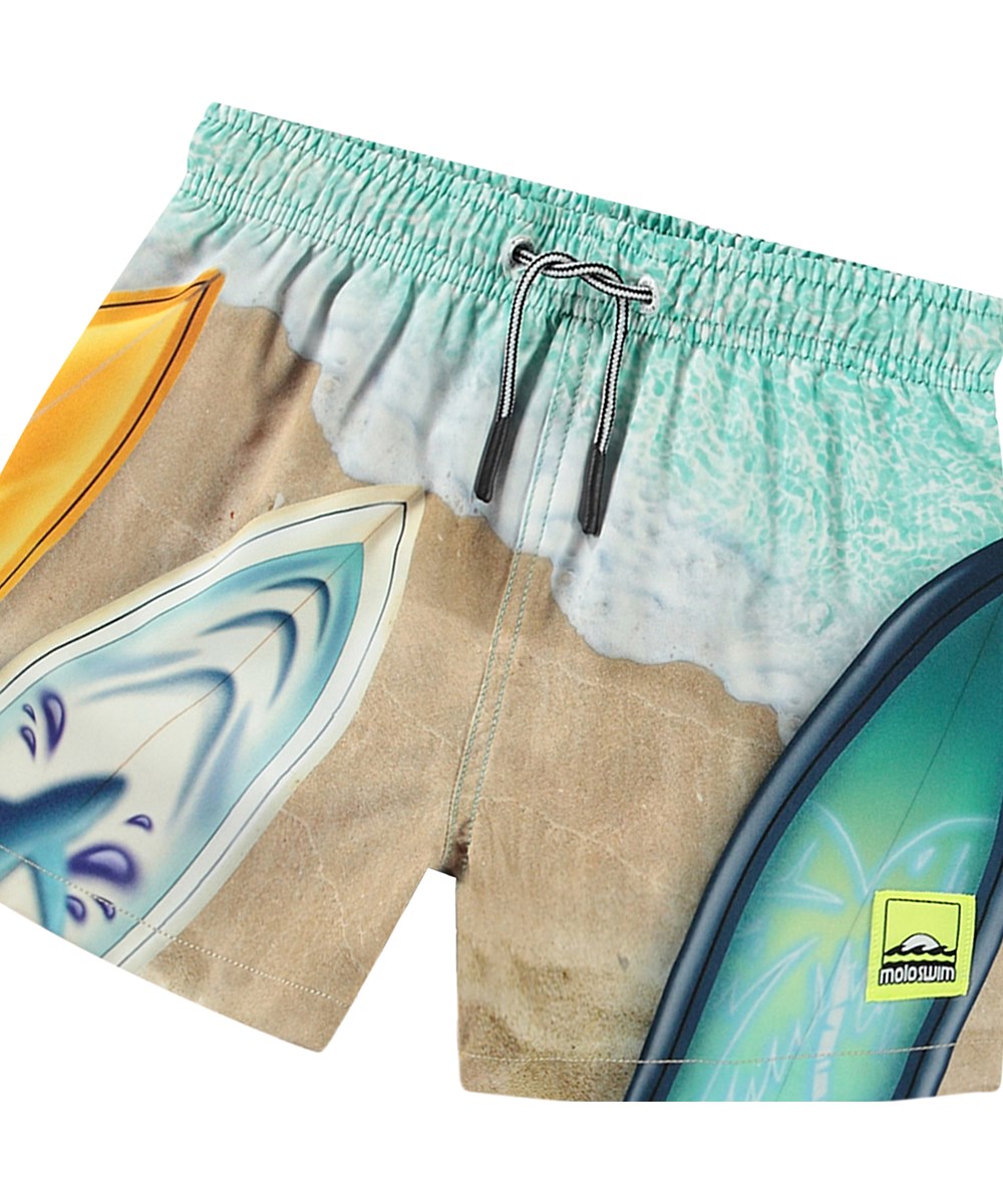 Niko - Surf Art - Sporty swim shorts for active children in recycled polyester with UV protection 50+.