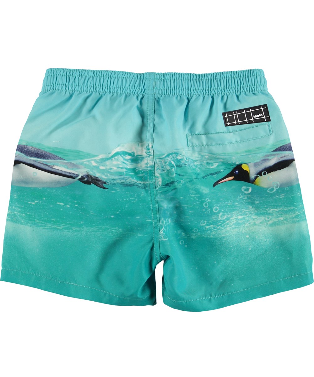 Niko - The Penguin - UV swim trunks with penguin print