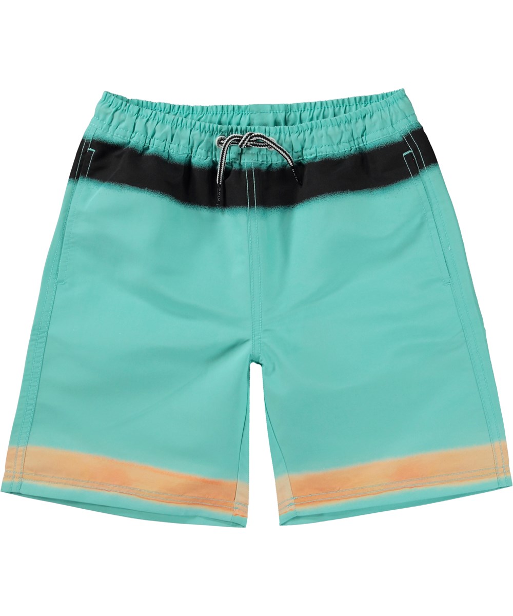 Nilson - Spray On Aqua - Turquoise swim shorts with long legs and placement spray paint print 