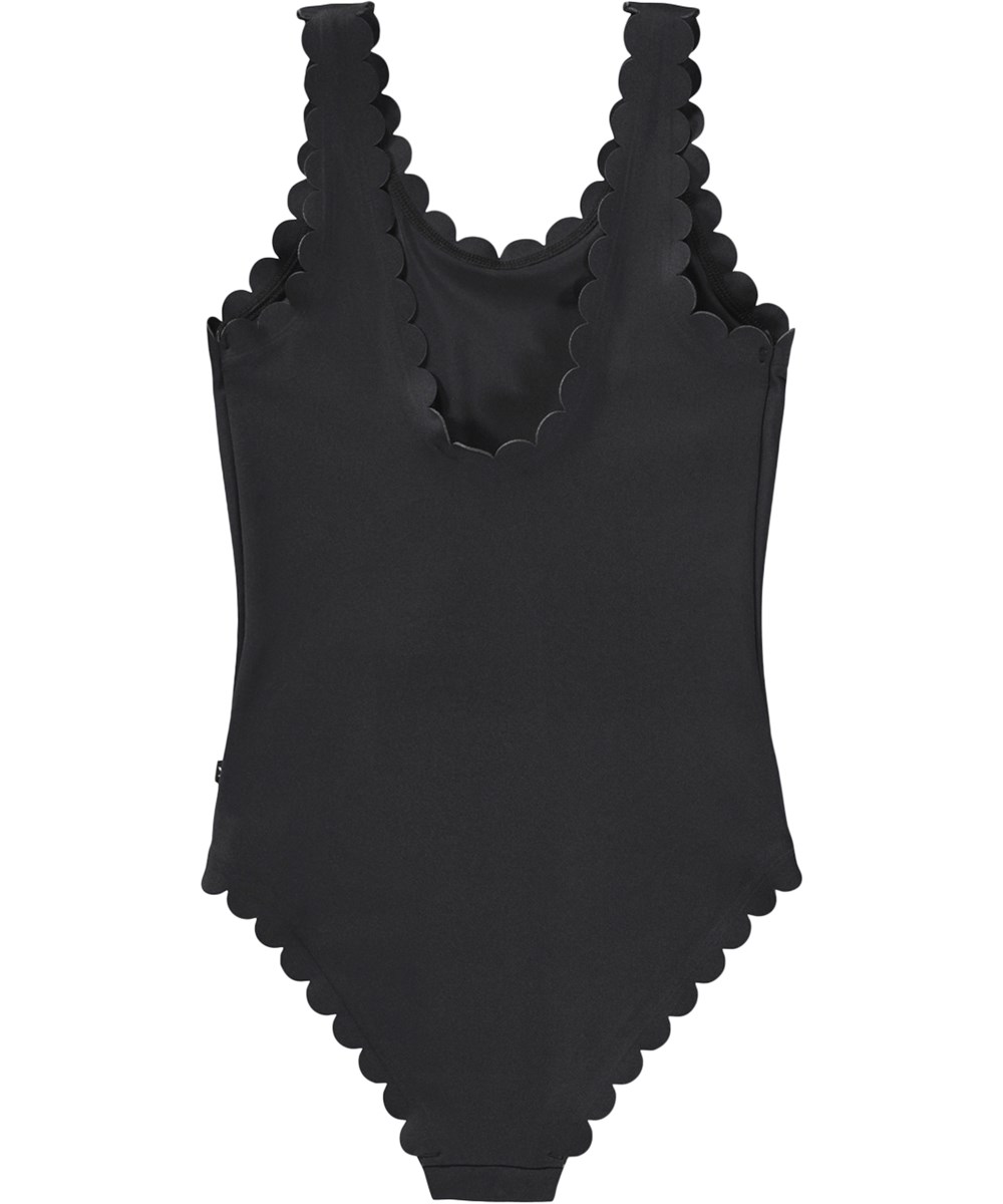 Noelle - Black - Black swimsuit with wave edges for children made from recycled polyester with UV protection 50+.