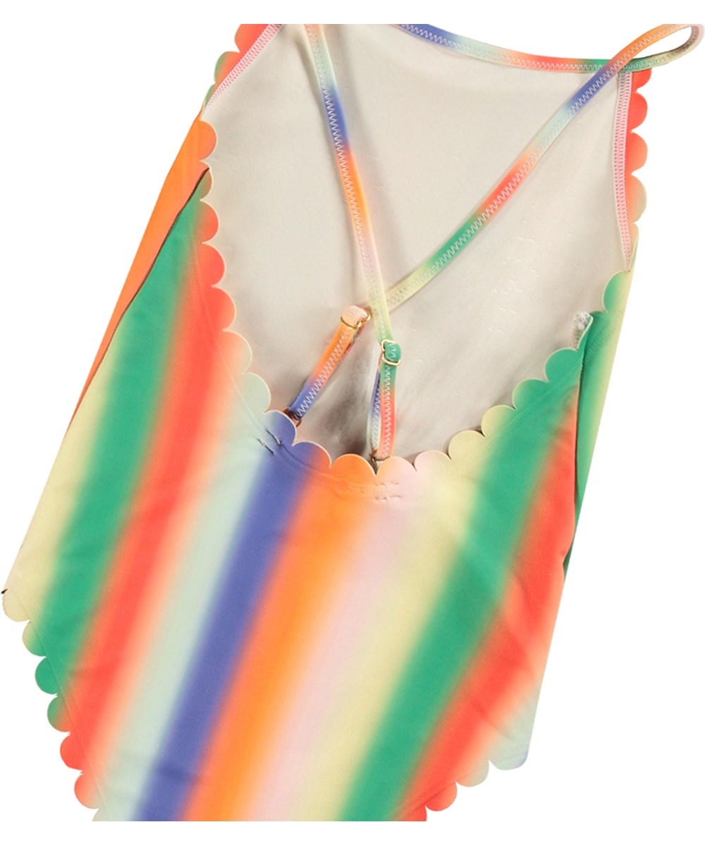 Noelle - Rainbow Light - Rainbow-coloured swimsuit for active children in recycled polyester with UV protection 50+.