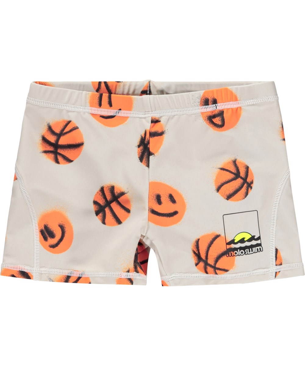 Norton - Fun Play - Sporty, beige swim shorts with basketball print for children Made from recycled polyester with UV protection 50+.