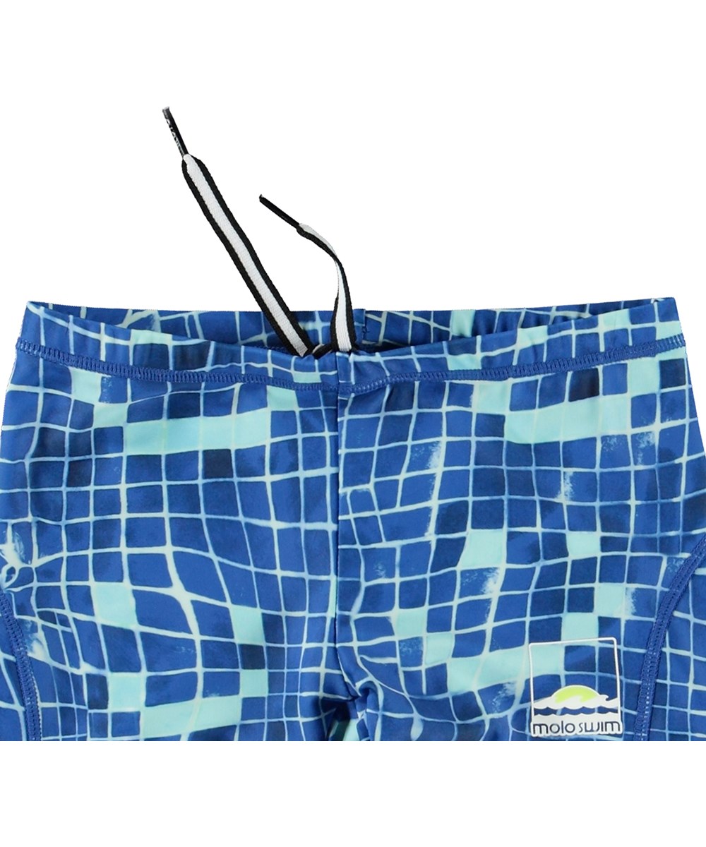 Norton - Tile Smile - Blue sporty swim shorts for active children in recycled polyester with UV protection 50+.