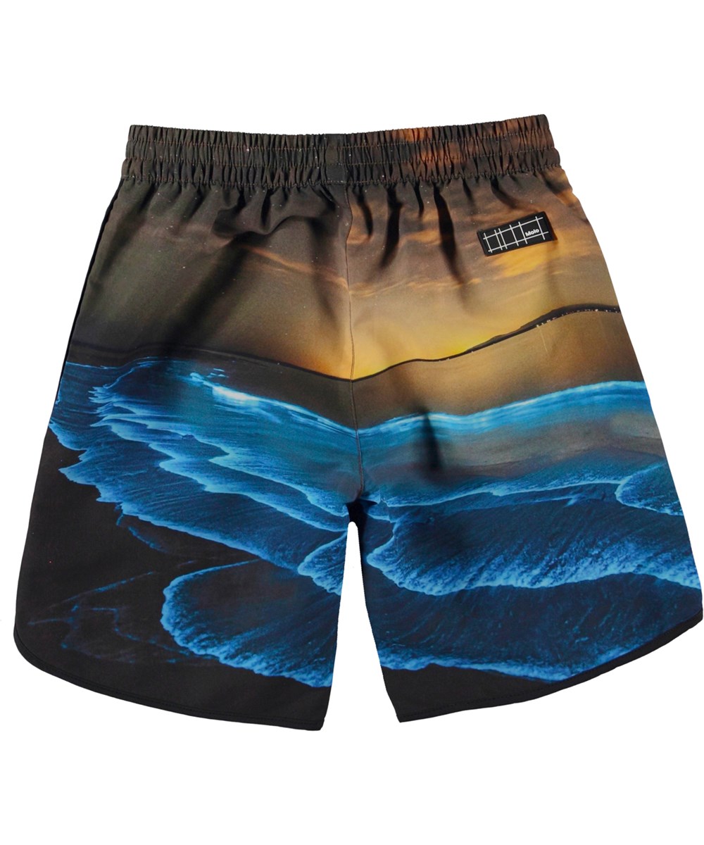 Nox - Glowing Ocean - Swim shorts with ocean print and sunset