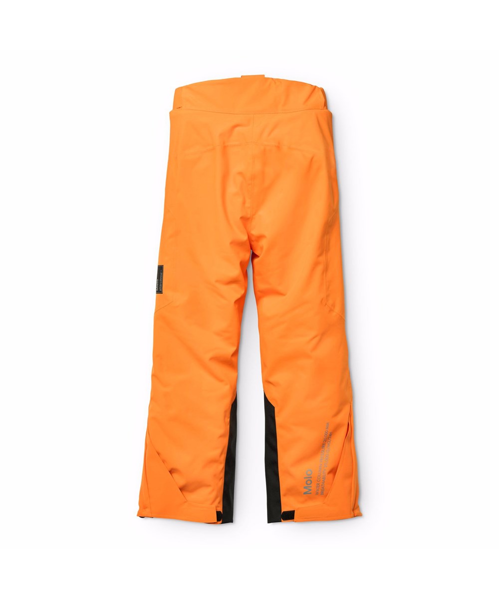 Jump Pro - Lava Orange - Orangea vind- och vattentäta skidbyxor för barn tillverkade av återvunnen polyester och vadderade med 3M™ Thinsulate™.