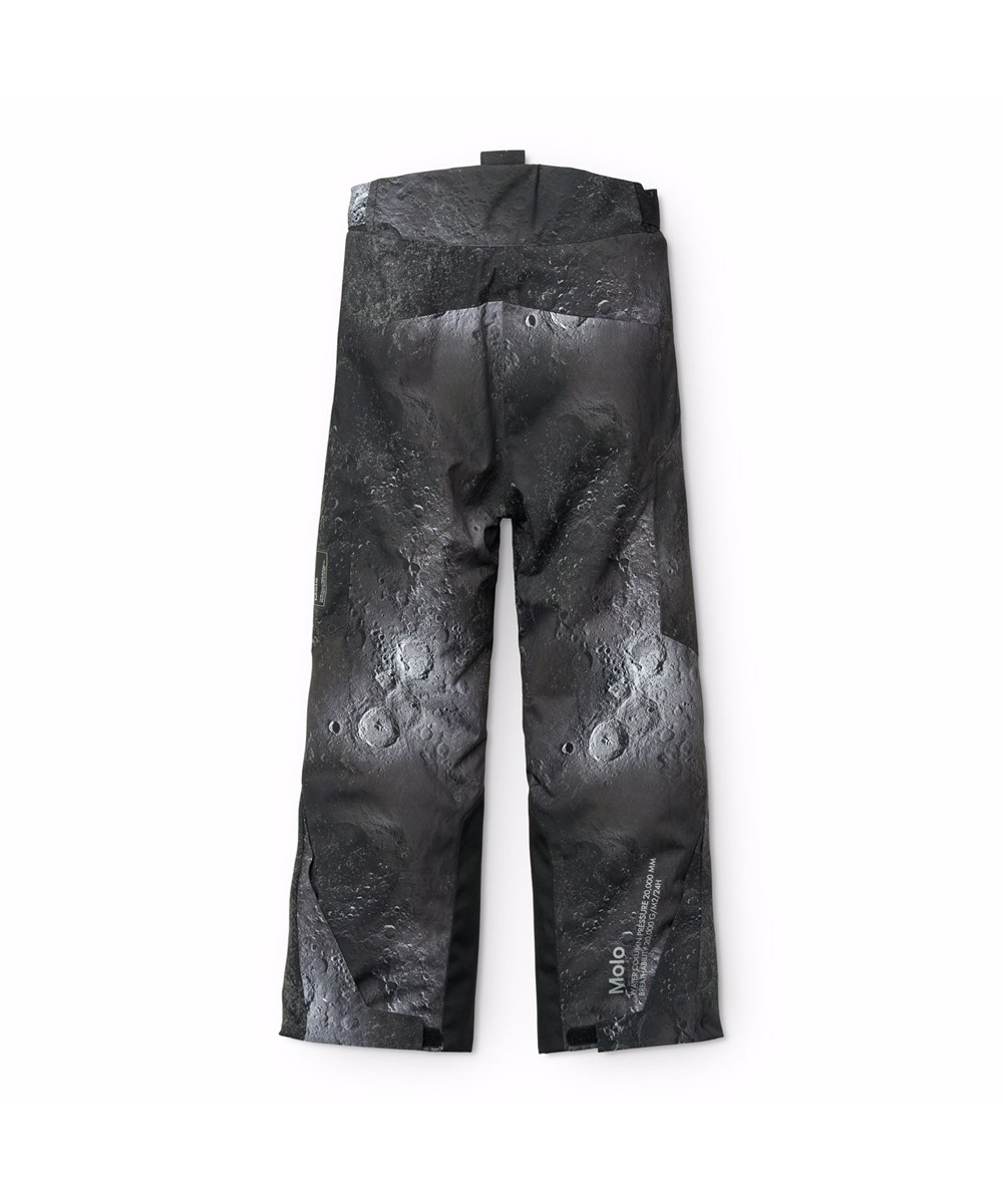 Jump Pro - Moon - Vind- och vattentäta skidbyxor för barn med månens råa strukturer och dess mörka och ljusa nyanser. Tillverkad av återvunnen polyester och vadderad med 3M™ Thinsulate™.