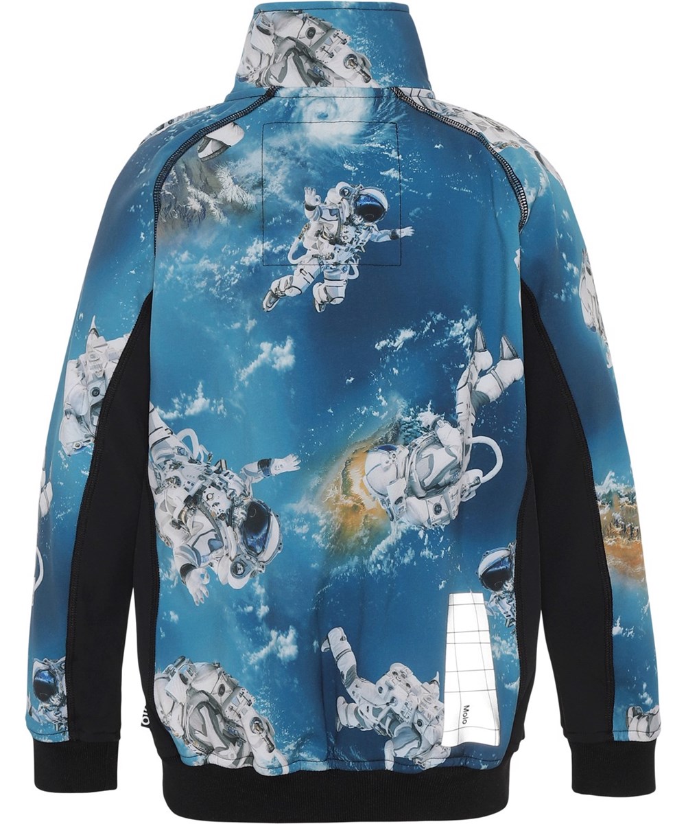 Cloudy - Astronauts - Återvunnen blåsoftshelljacka med astronautmönster.