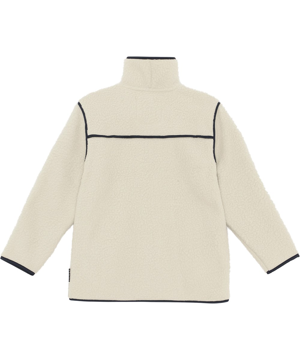 Halina - Moon - Återvunnen vit fleecejacka med mörka kanter.