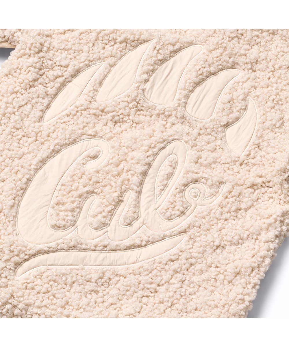 Ulan - Vanilla - Off-white fleecejacka för barn tillverkad av återvunnen polyester med en fin ryggdetalj i hållbar nylon.